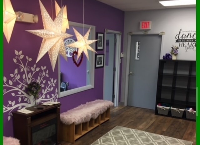 Studio lobby with glowing star lanterns and purple accent wall