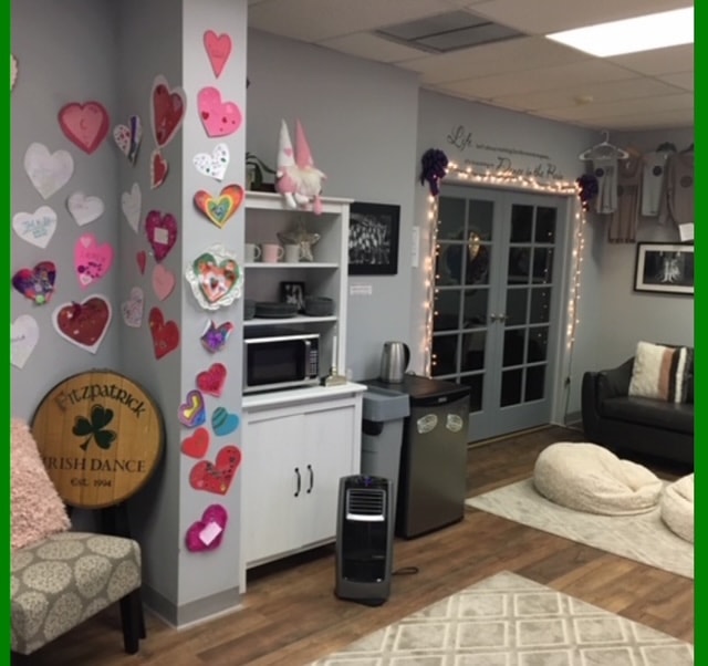 Studio lobby with Fitzpatrick Irish Dance barrel sign and Valentine heart decorations